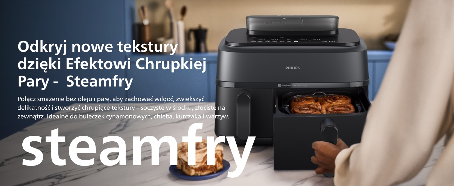 Tekst brzmi „steamfry” i „Odkryj nowe tekstury dzieki Efektowi Chrupkiej Pary - Steamfry”. Pokazuje urządzenie kuchenne z gotowanym jedzeniem w środku.