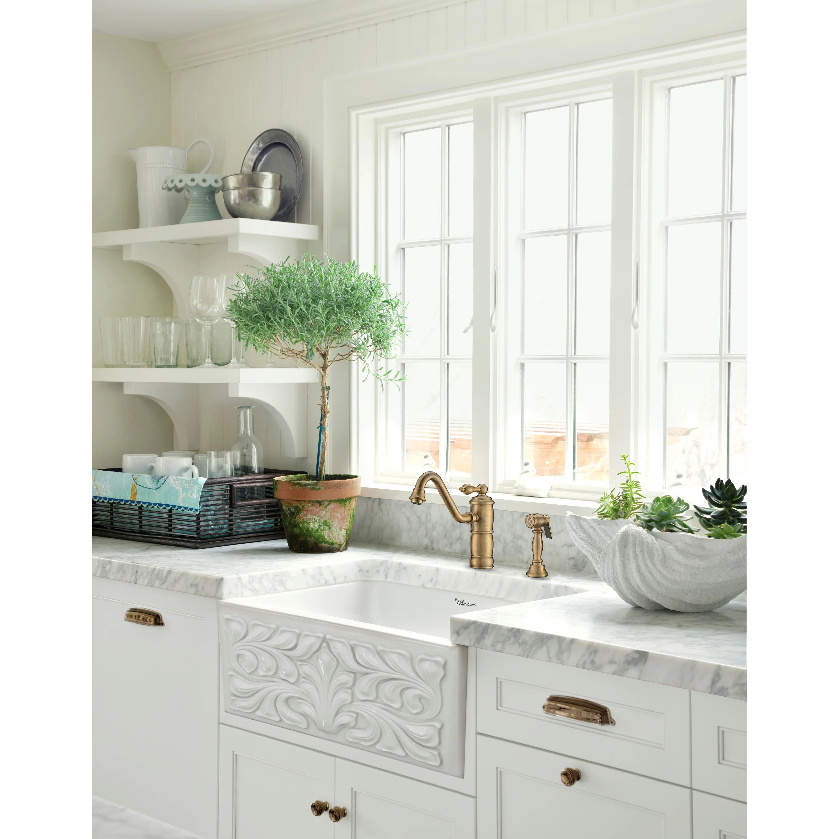 Farmhaus Fireclay Reversible Sink with a Gothichaus Swirl Design Front Apron on One Side, and a Fluted Front Apron on the Opposite Side.