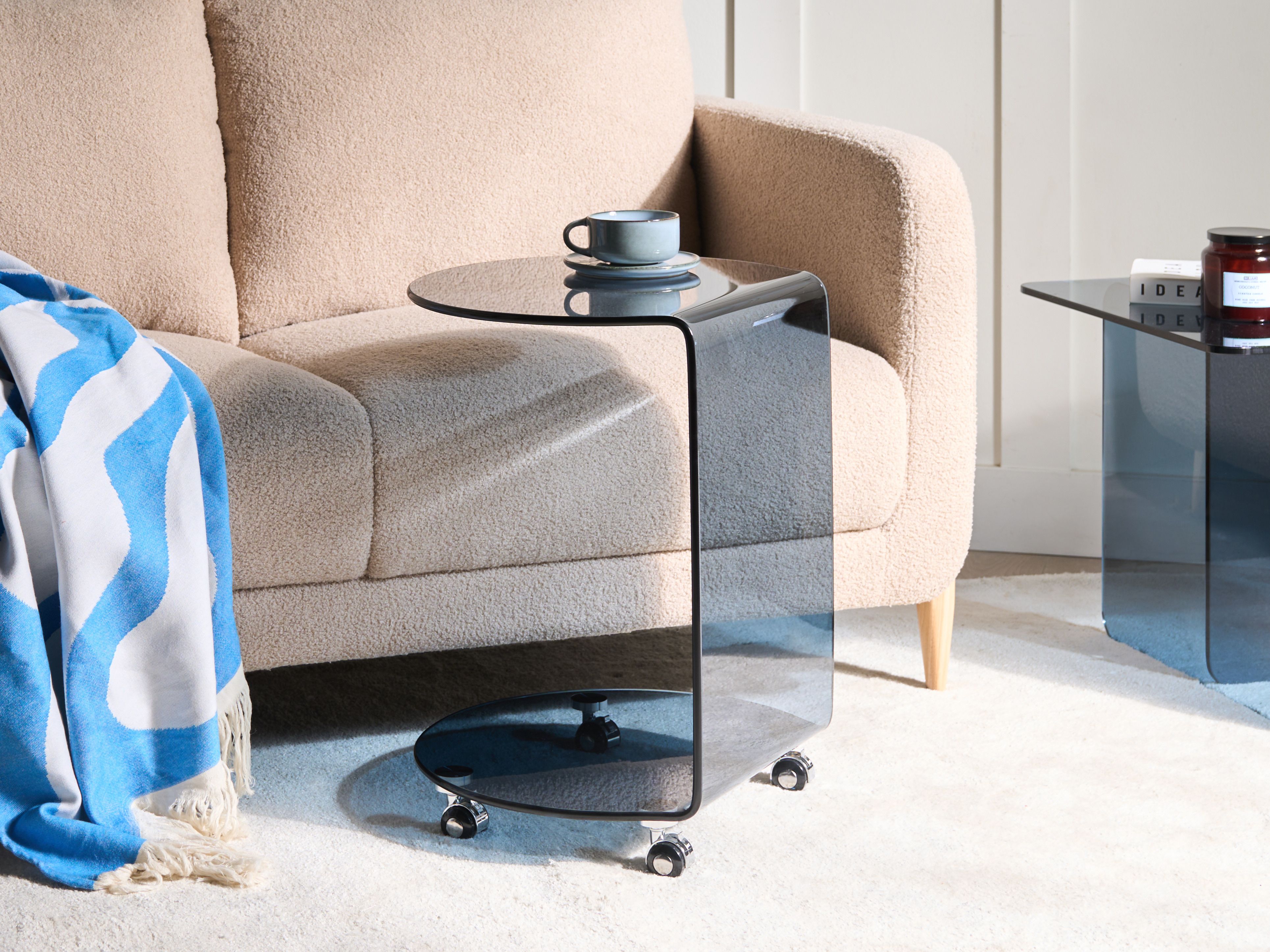 Side Table MINTO Tempered Glass Blue with Wheels