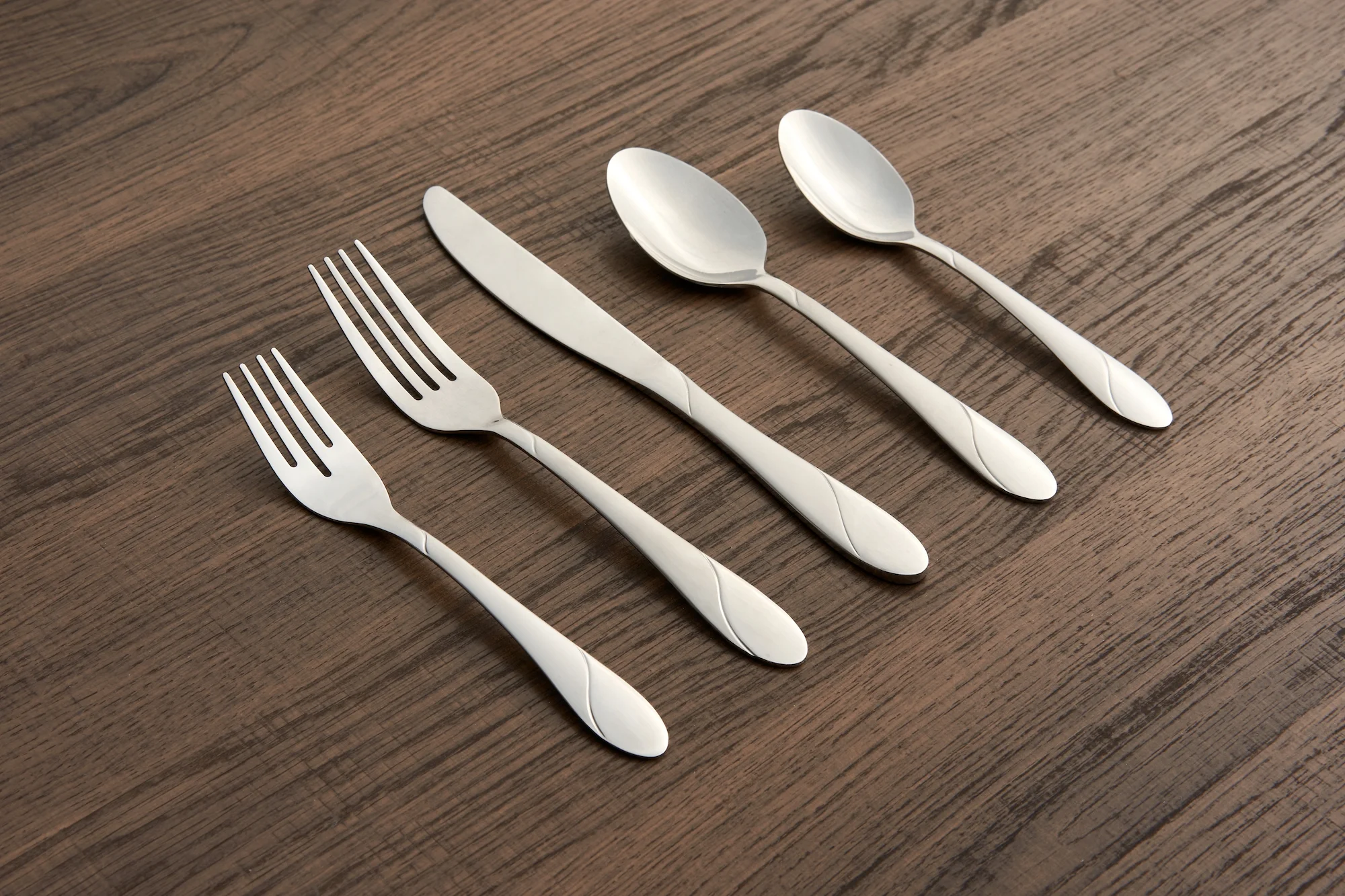 Cambridge Silversmiths Swirl Sand 89-Piece Flatware Set with 5-Piece Hostess Set