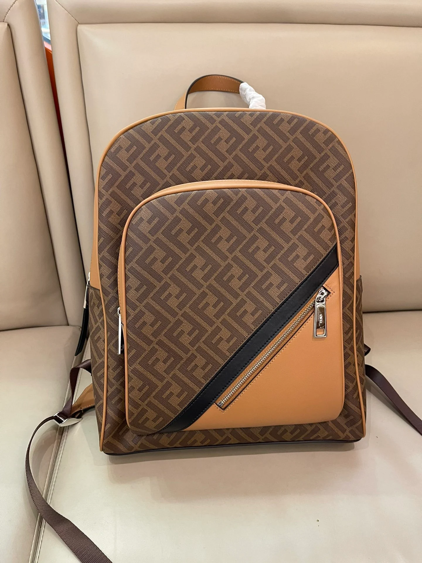 Trendy Fendi Backpack With Signature FF Pattern And Contrasting Yellow Accent 7VZ074 - Replicaclubs
