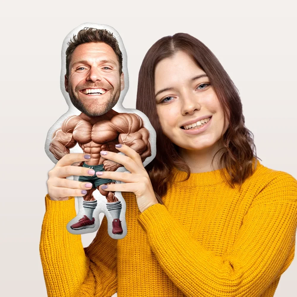 Smiling woman holding a personalized muscle man photo pillow, a unique custom gift idea