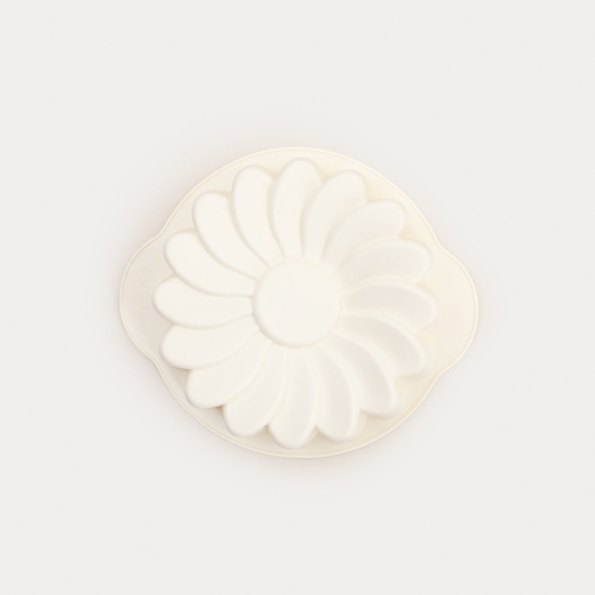 Forma silikonowa MOLLIS ES do pieczenia w kształcie kwiatka śmietankowa 20,5x18x4 cm