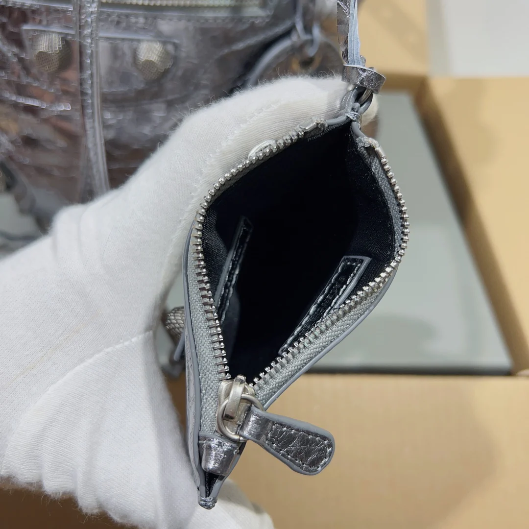 Metallic Balenciaga Bucket Bag with Studs and Adjustable Straps for Edgy Fashion Style No.3033 - Replicaclubs
