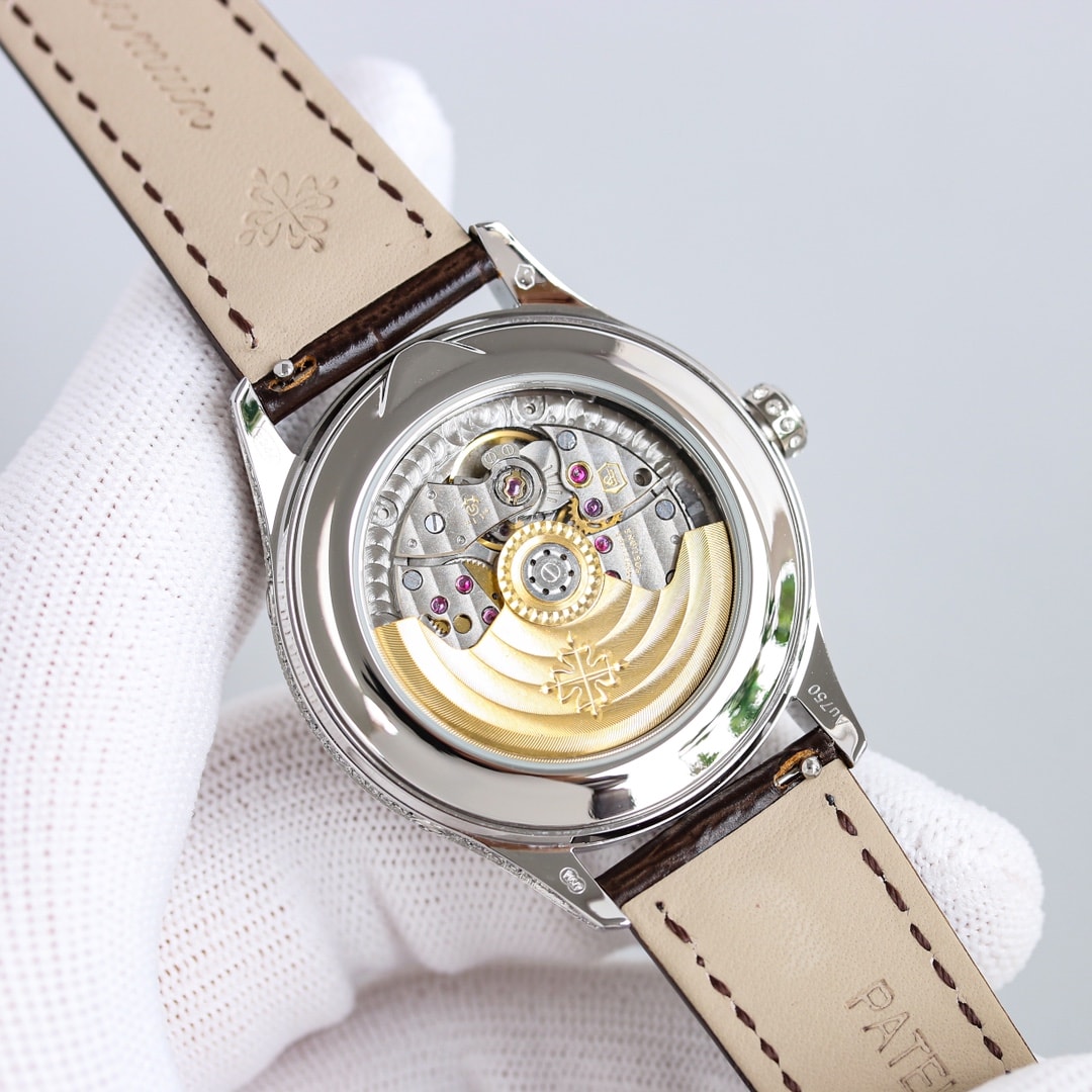 Fake Patek Philippe Replica Watch 4948G-001 Complications Ladies Annual Calendar Moon Phase 38mm Black Tahitian Mother of Pearl Arabic White Gold Diamond Set Leather(1:1 replica) - Elite Watch Atelier