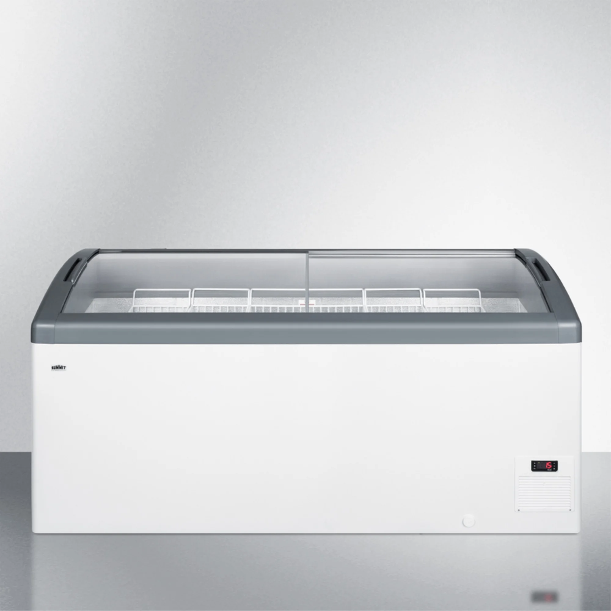 Curved top commercial ice cream freezer made in Denmark, with sliding glass lid, digital thermostat, novelty baskets, and 17.1 cu.ft. interior