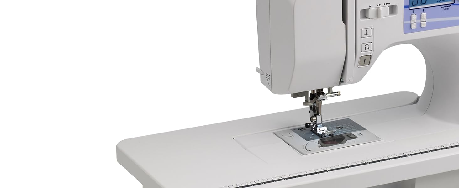 Image en gros plan montrant le système d'entraînement de la machine sur fond blanc