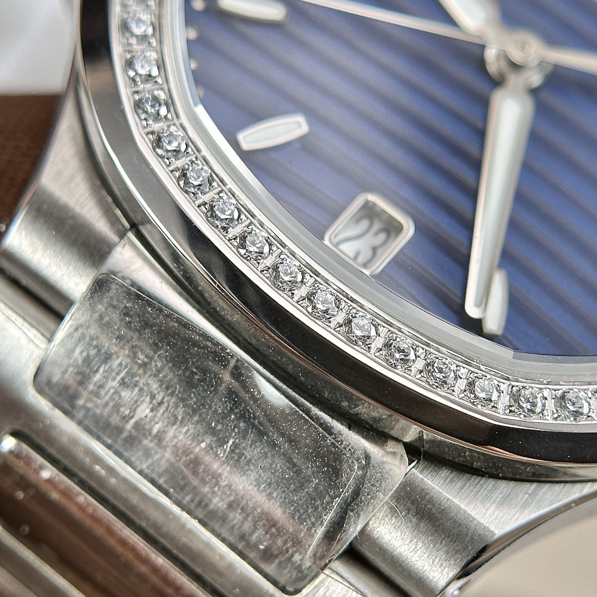 Patek Philippe Nautilus 7118 Replica Watch Blue Dial Stone Bezel 35.2mm - Top club