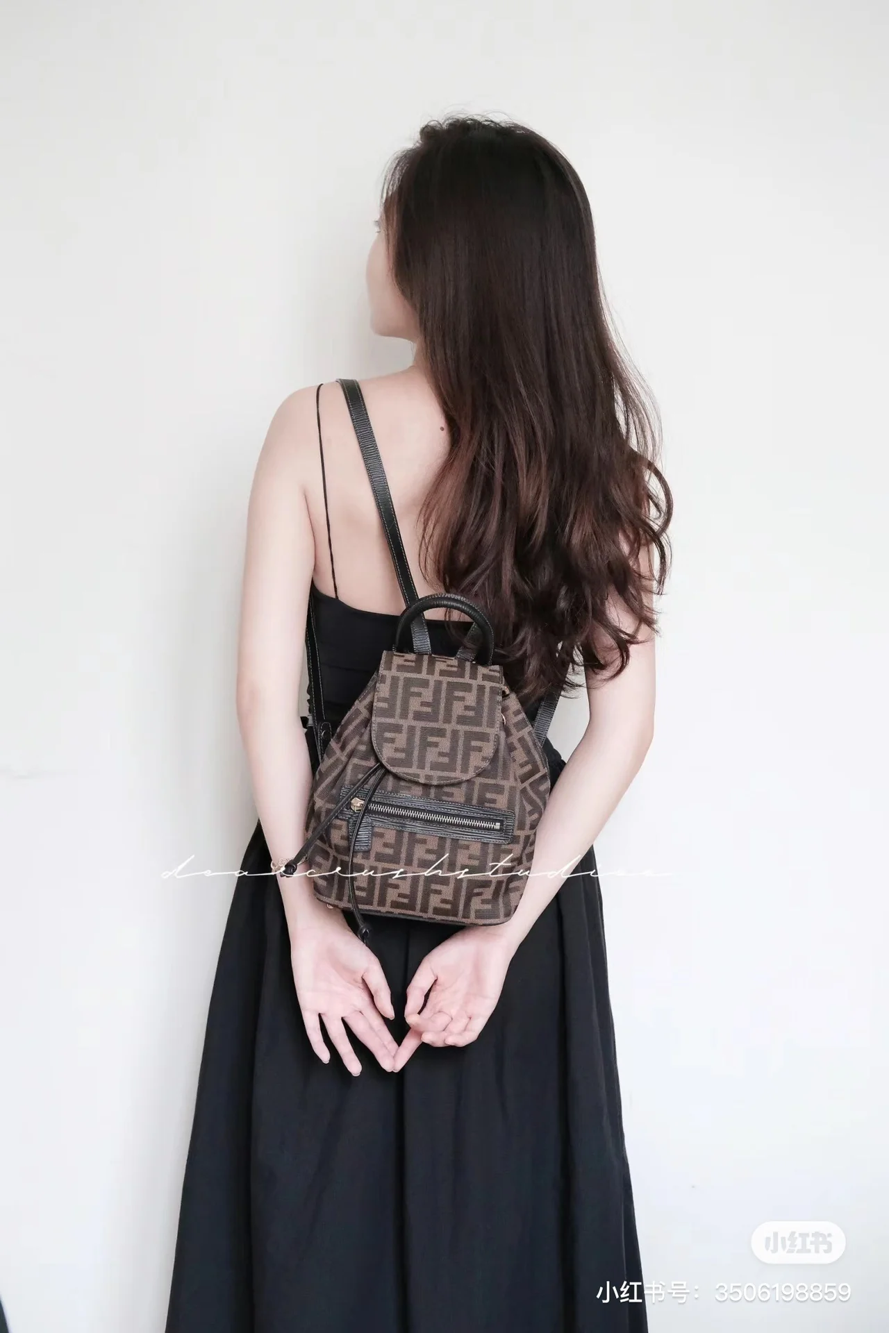 Elegant Fendi Mini Backpack With Iconic FF Pattern And Gold - Tone Hardware 185 - Replicaclubs