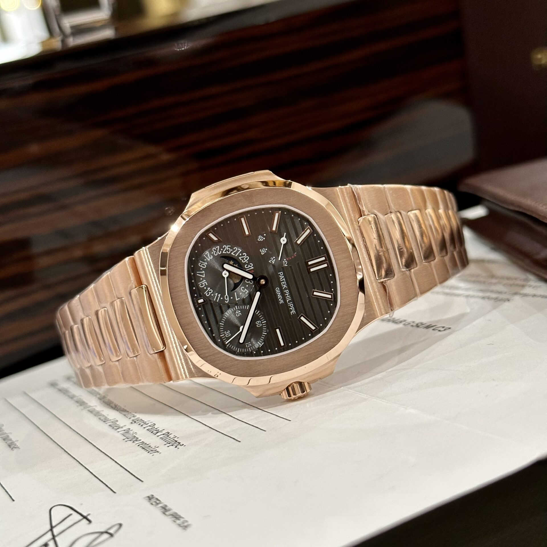 Patek Philippe Replica Watch Nautilus 5712 Rose Gold Plated Black Dial GRF 40mm - Elite Watch Atelier
