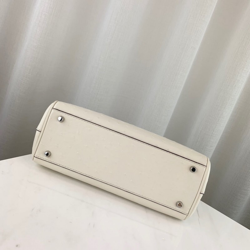 Replica Gucci Zumi Ostrich Leather Medium Top Handle Bag 569712 White1:1High-quality replica