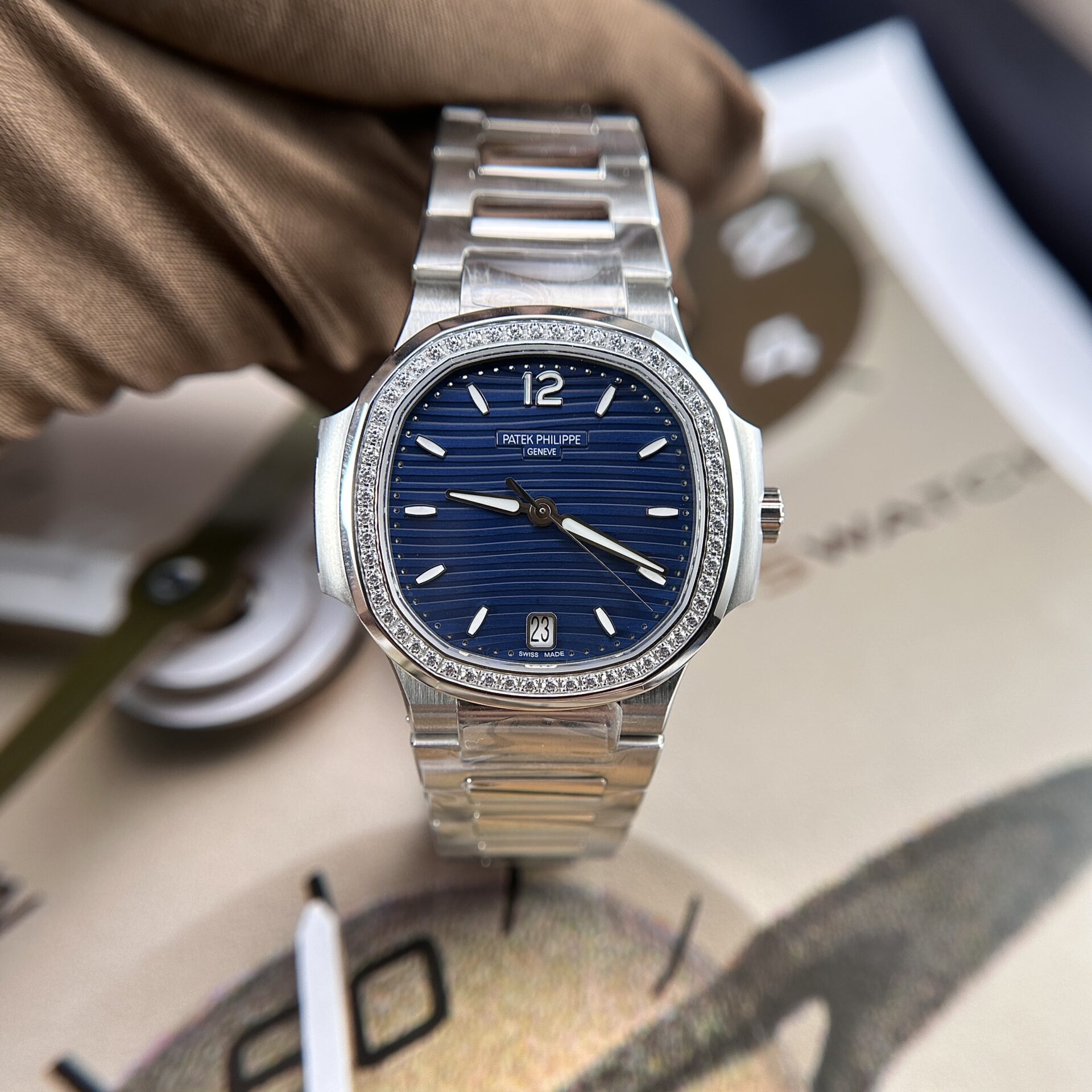 Patek Philippe Nautilus 7118 Replica Watch Blue Dial Stone Bezel 35.2mm - Top club