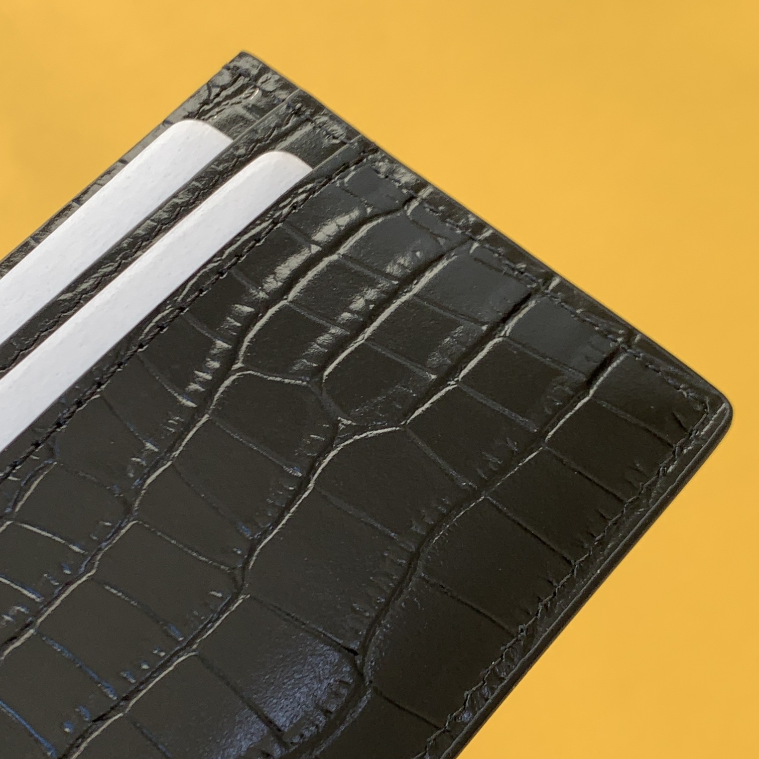CASSANDRE MATELASSÉ CARD CASE IN GRAIN DE POUDRE EMBOSSED LEATHER1:1High-quality replica