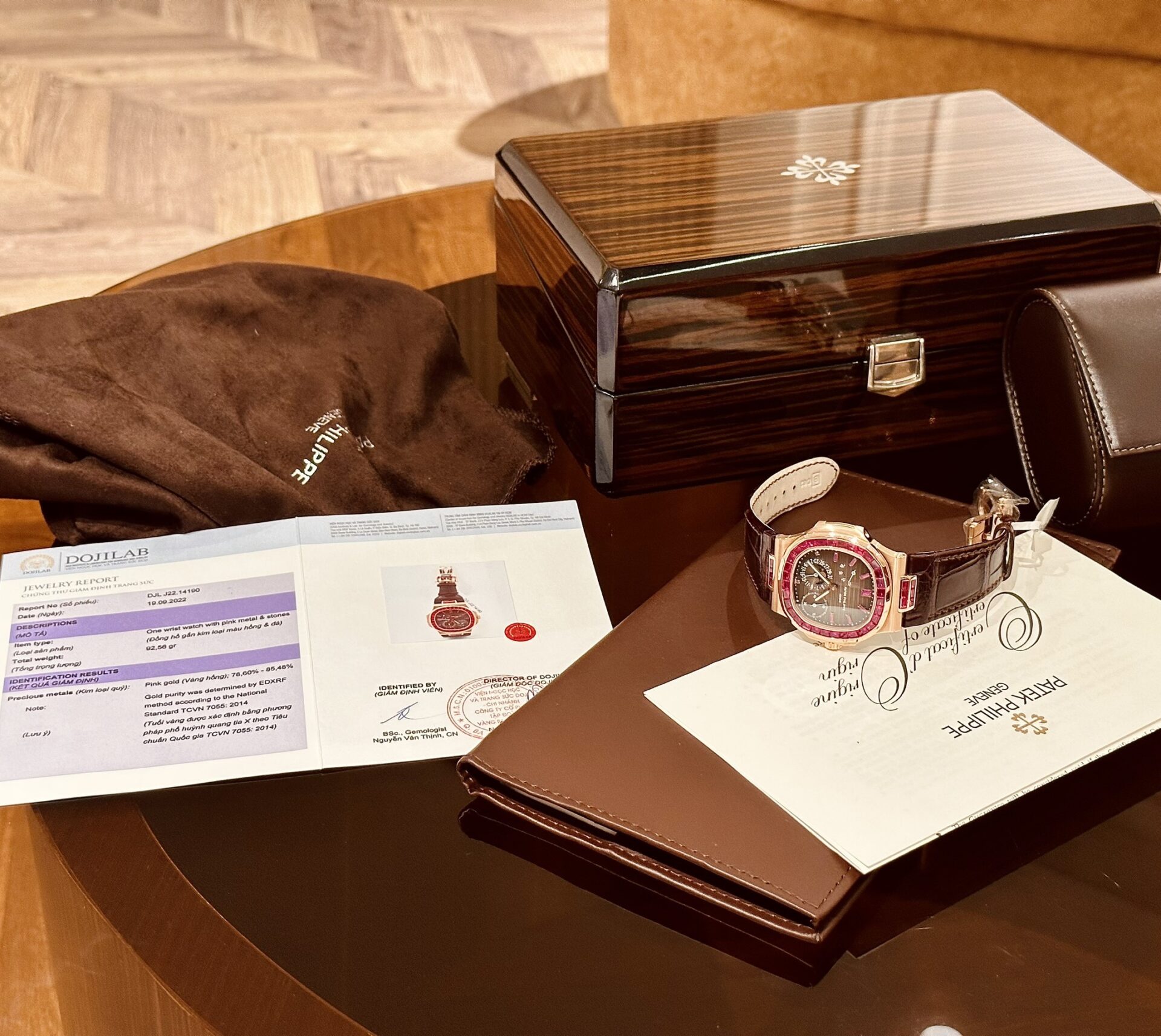 Patek Philippe Nautilus 5724 Gold Wrapped With Ruby Bezel 40mm - Elite Watch Atelier