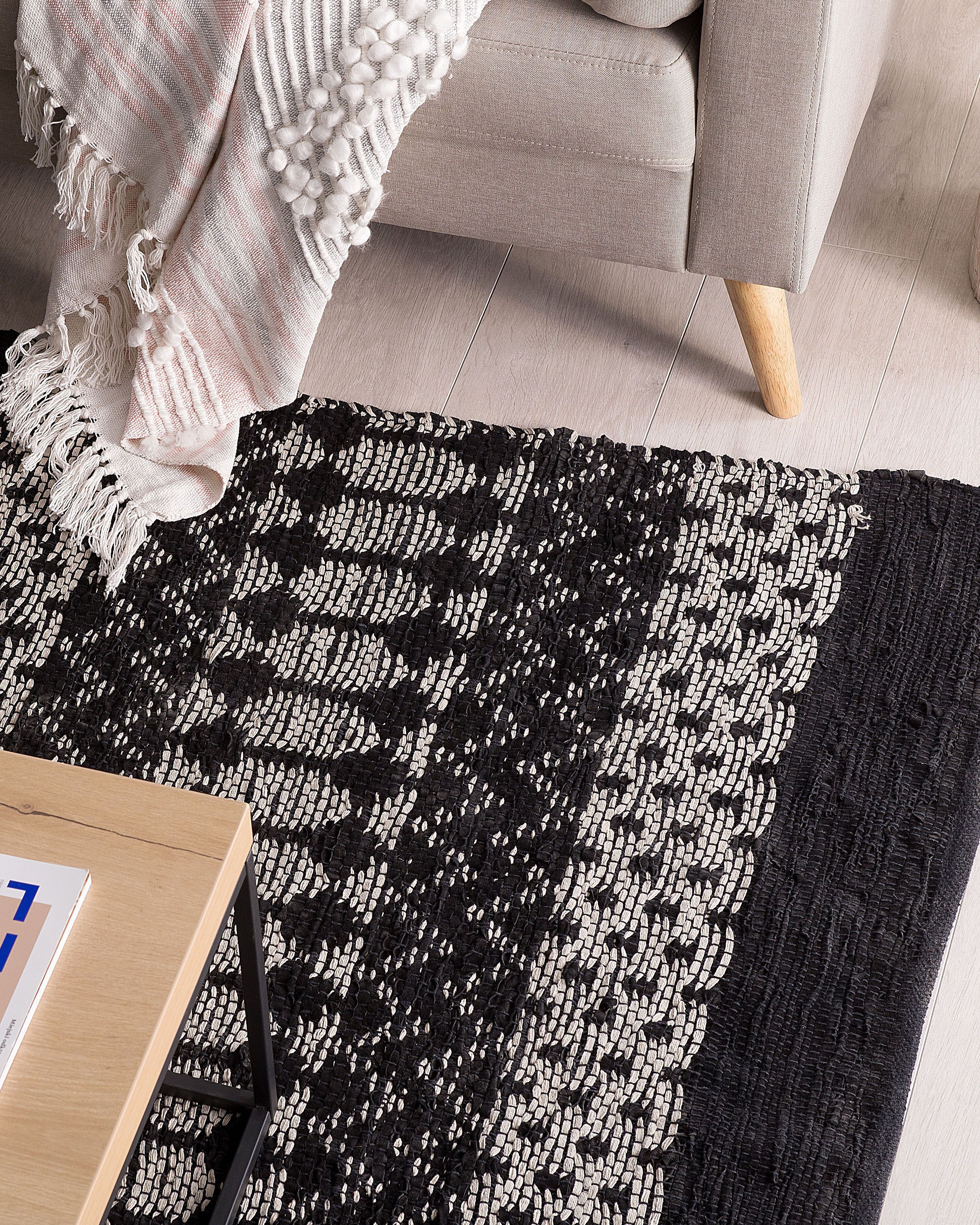 Rug SOKUN Black 140 x 200 cm Leather
