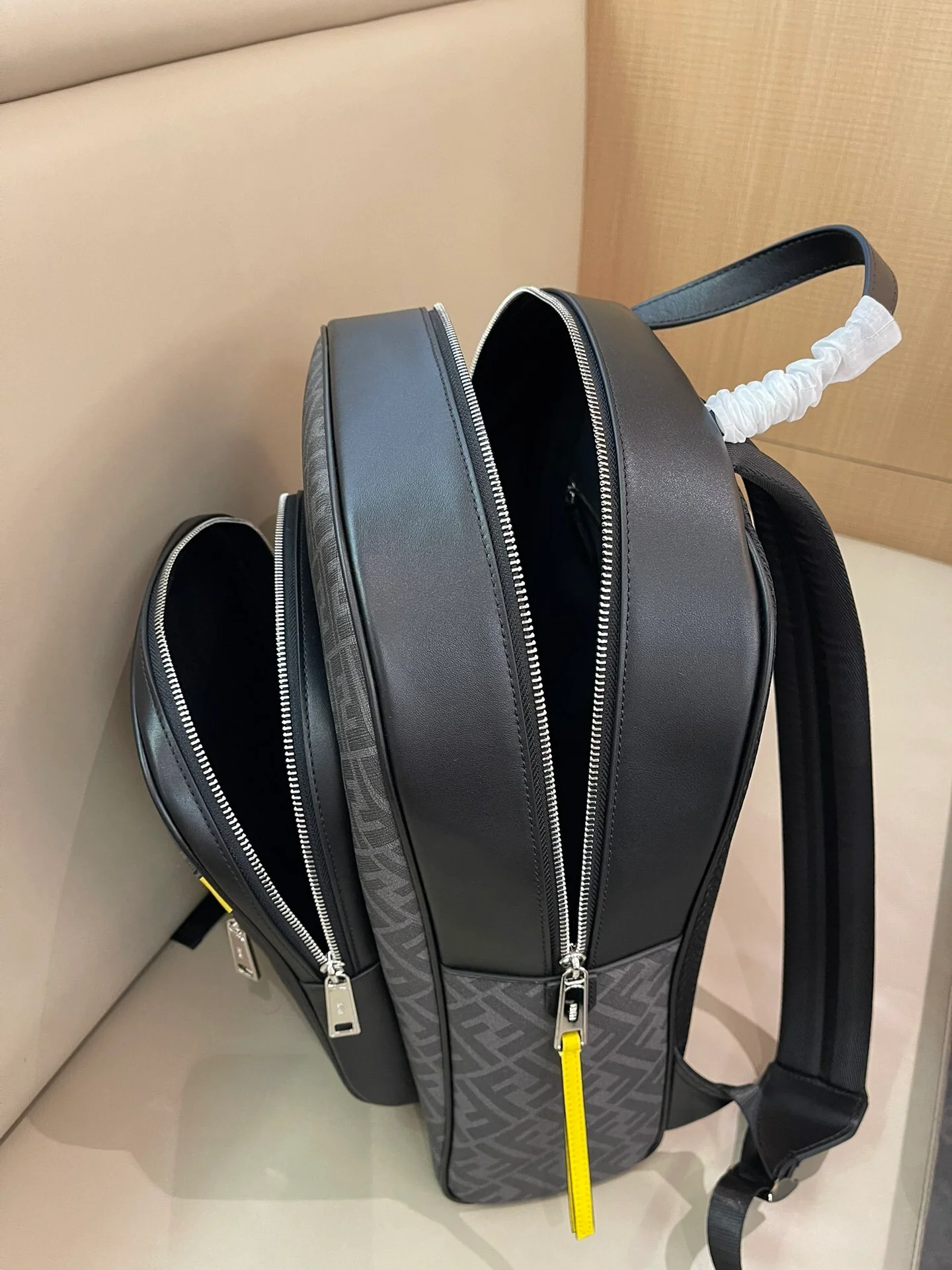 Trendy Fendi Backpack With Signature FF Pattern And Contrasting Yellow Accent 7VZ074 - Replicaclubs