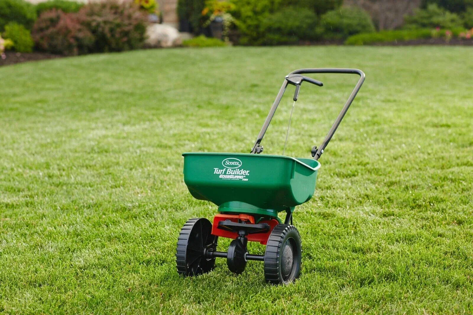 Scotts Turf Builder EdgeGuard Mini Broadcast Spreader - 5,000 Sq. Ft. - Image 2 Scotts Turf Builder EdgeGuard Mini Broadcast Spreader - 5,000 Sq. Ft. - Image 2