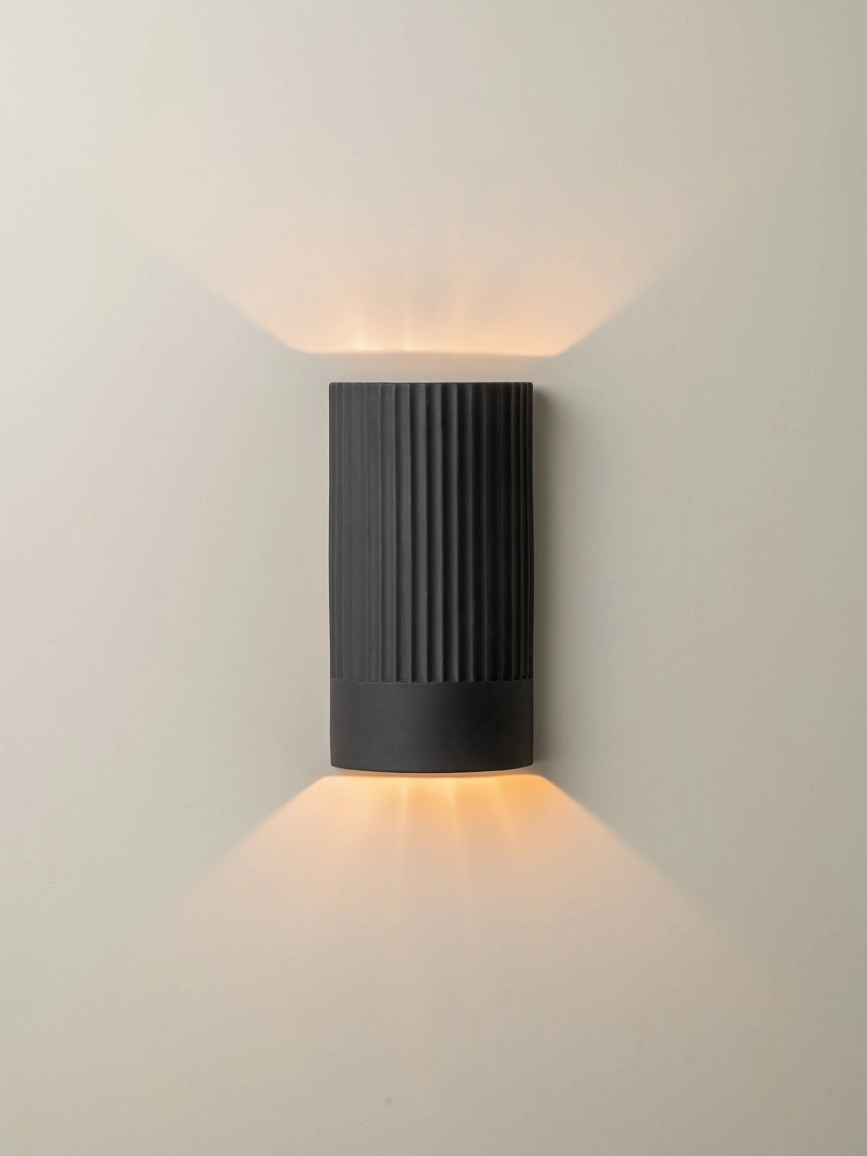 Nitara - chocolate ribbed concrete wall light