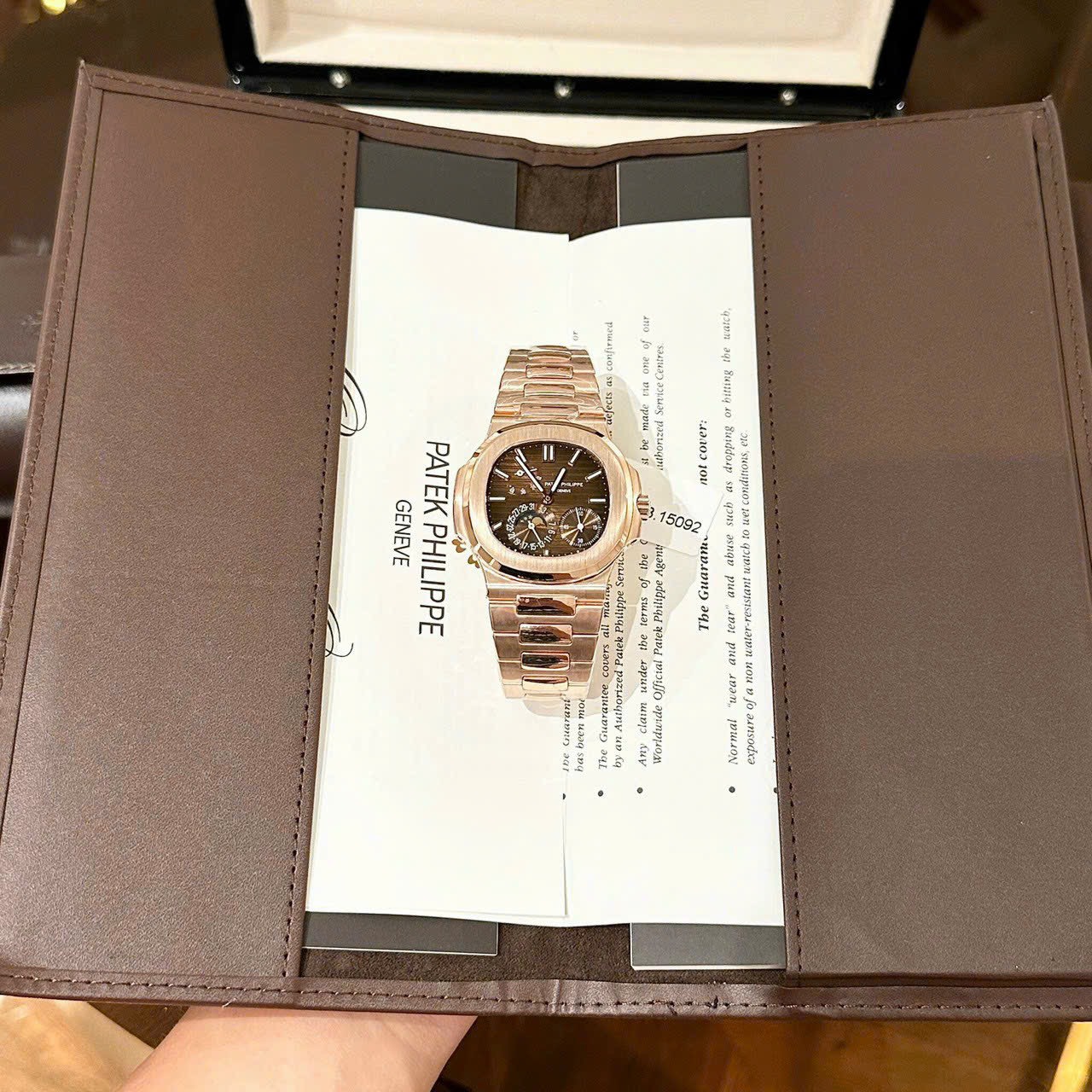 Patek Philippe Nautilus 5712 Gold Wrapped Chocolate Dial GRF 40mm - Elite Watch Atelier