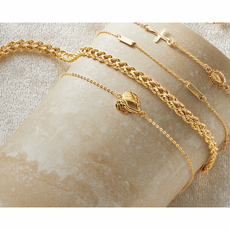 10K Gold Wings/Heart Bracelet - MIDNIGHT VELVET CATALOG