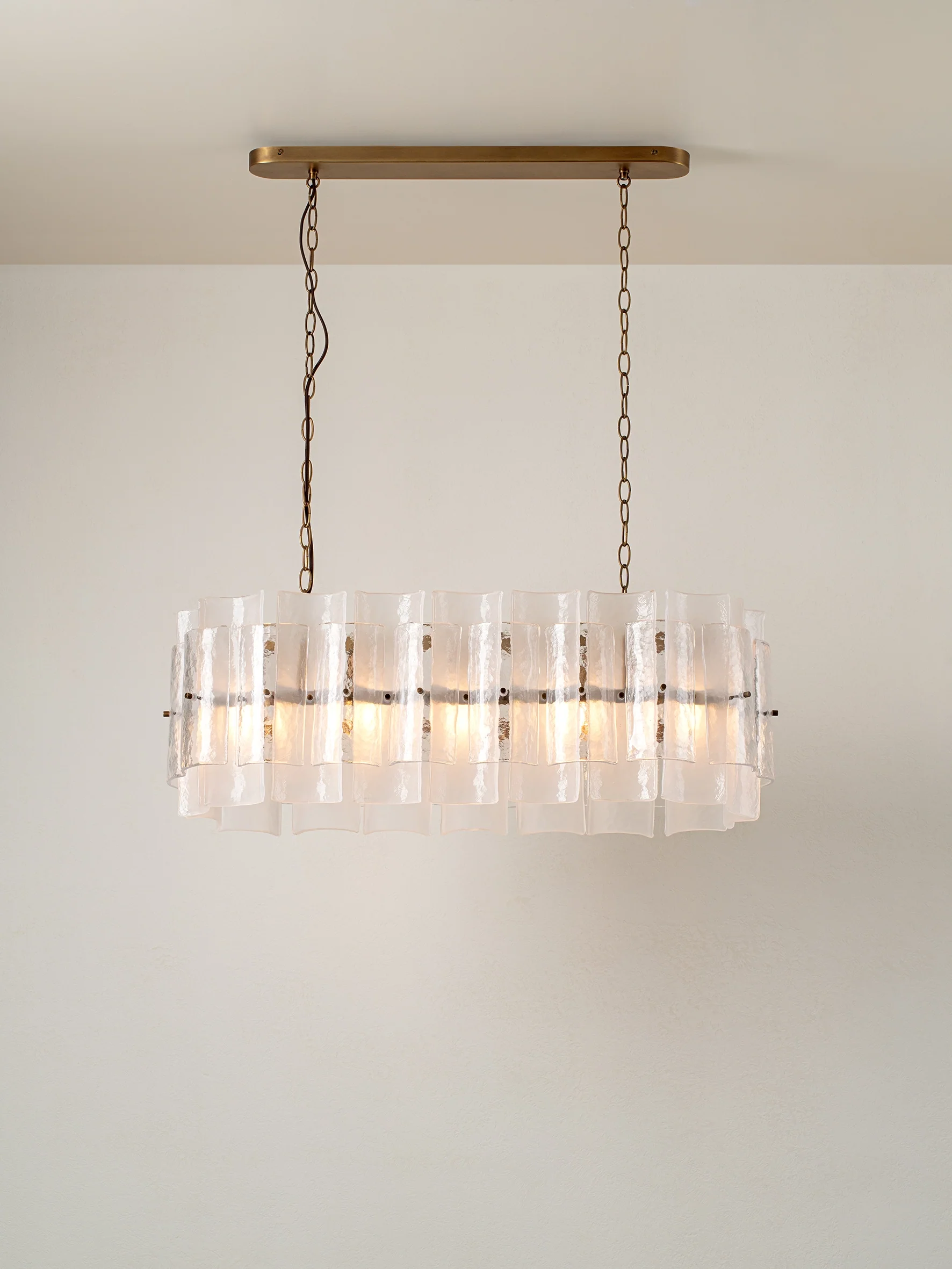 Pazo - 9 light layered textured glass oval chandelier