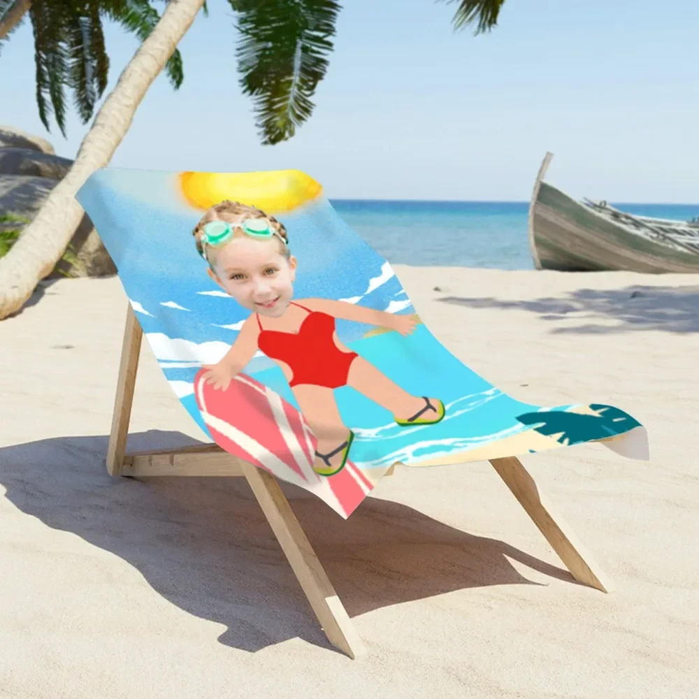 Customized kids beach towel with a personalized cartoon boy design, draped over a wooden lounge chair on the beach