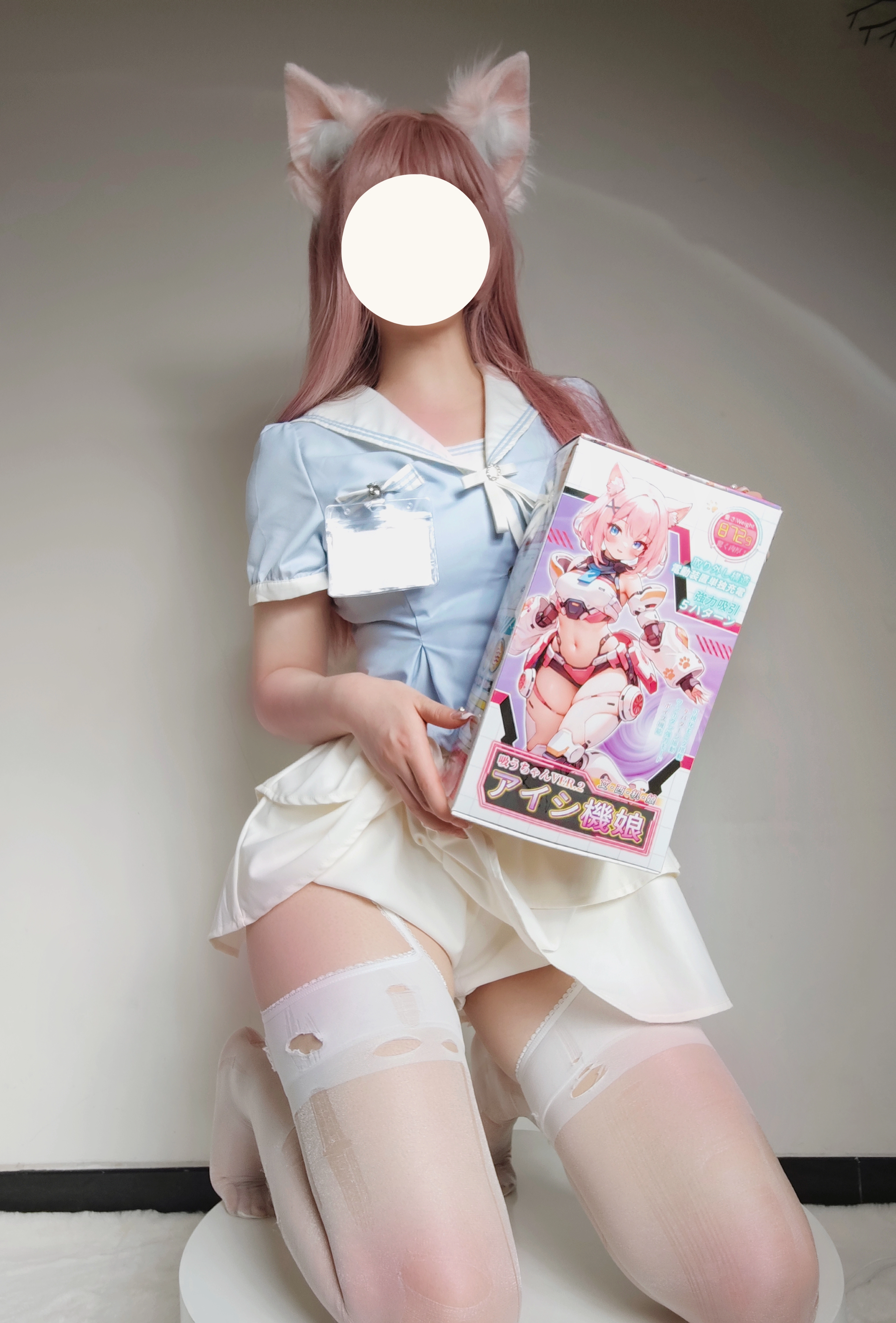 Compact multi-color anime pocket masturbator eggs beside plain discreet packaging on a blue and white background