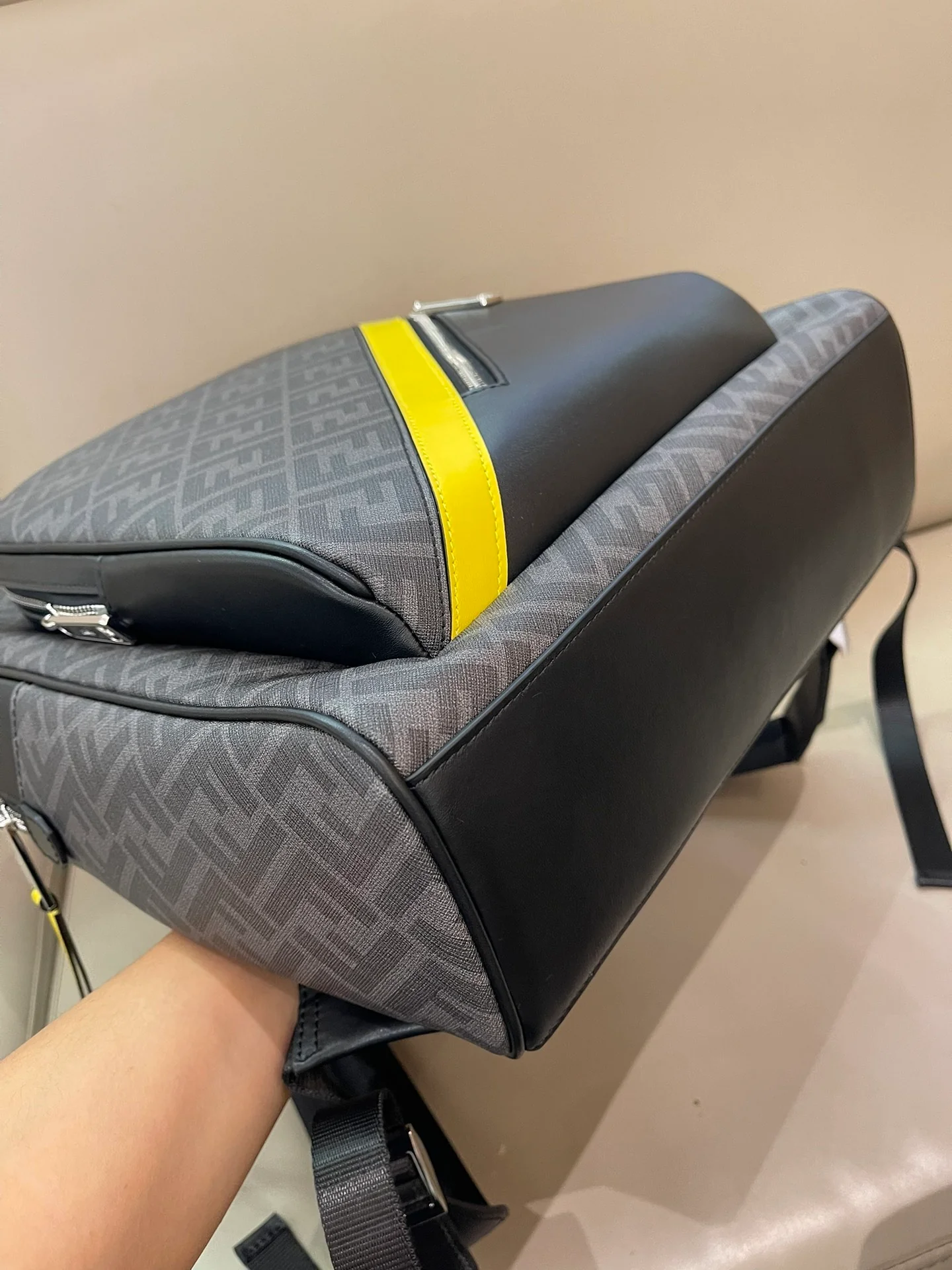 Trendy Fendi Backpack With Signature FF Pattern And Contrasting Yellow Accent 7VZ074 - Replicaclubs