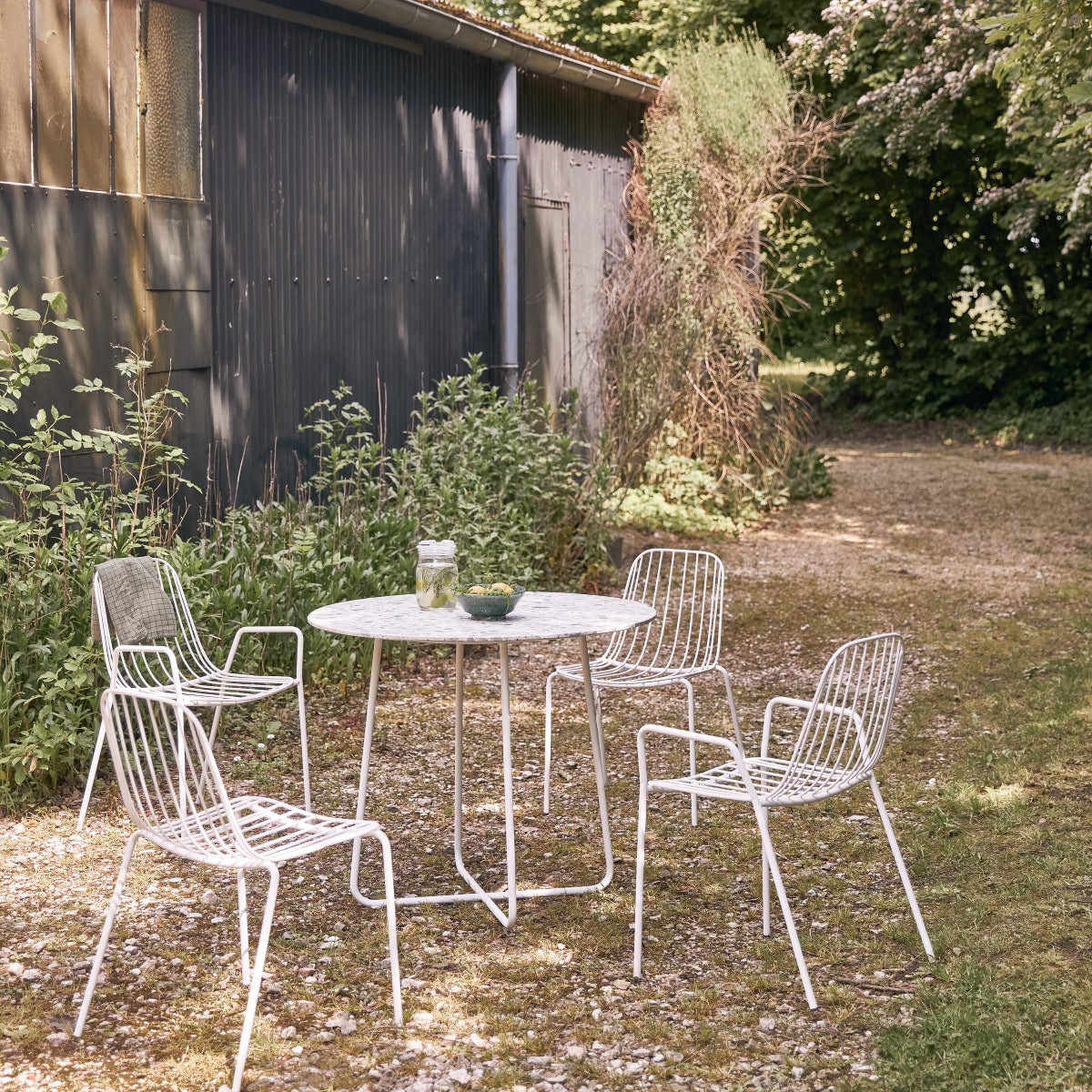 Tikamoon - Ronde tuintafel in premium terrazzo en groen metaal 4 p.