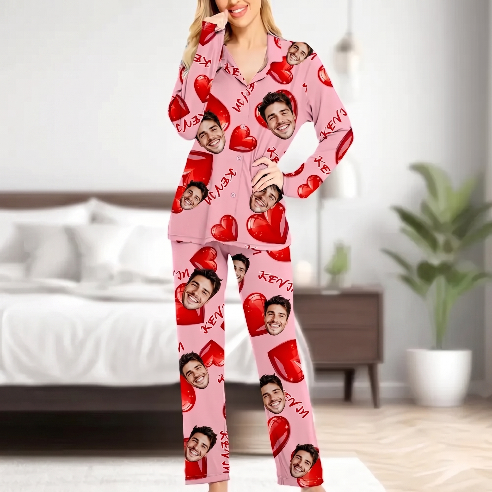 Front view of a woman wearing personalized pink sleepwear featuring custom face cutouts and a heart pattern