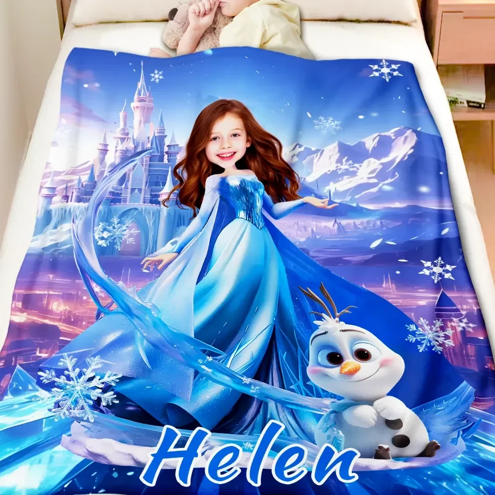 Custom blue princess and ice castle theme blanket with the name Helen, displayed on a bed