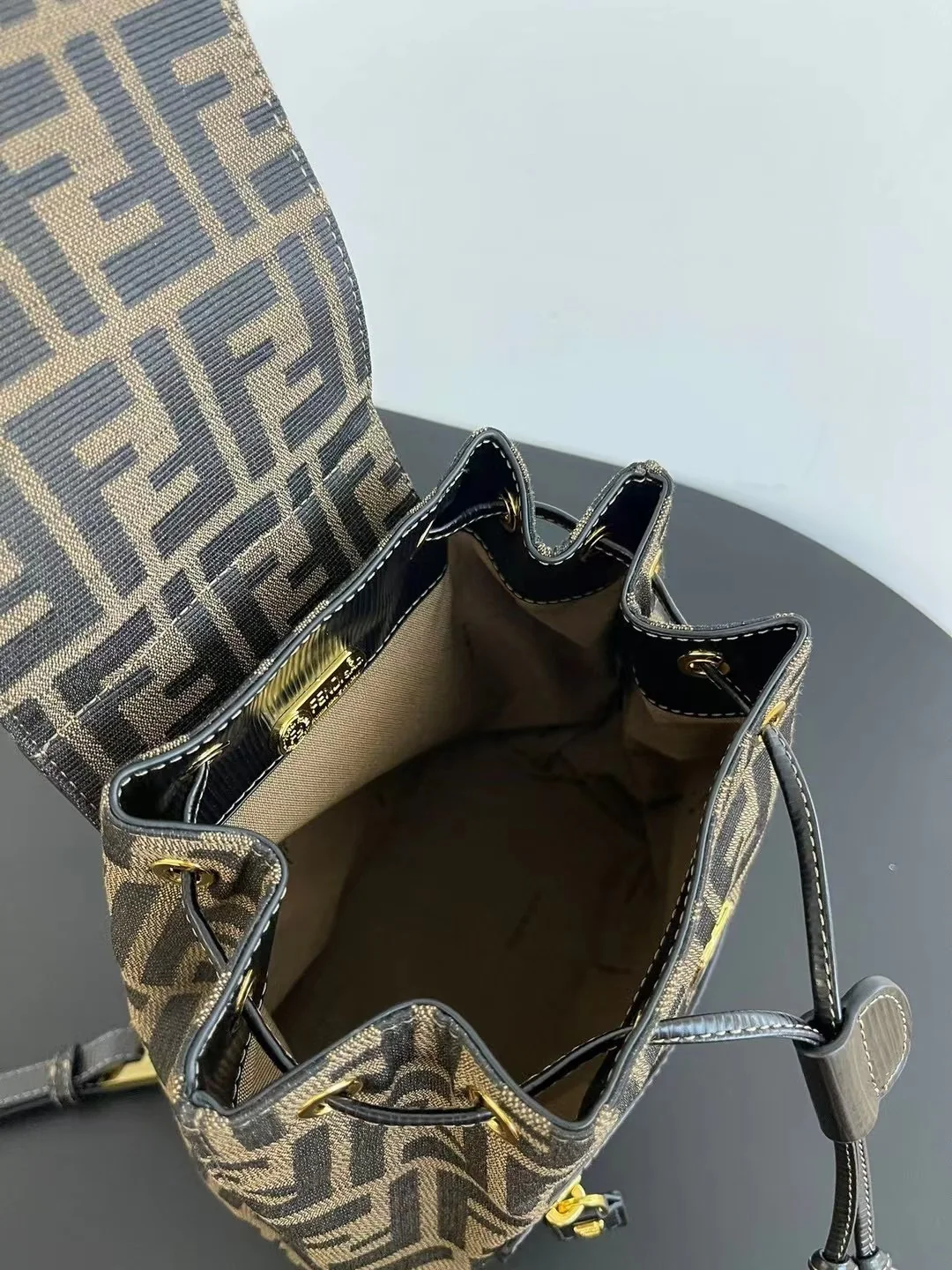 Elegant Fendi Mini Backpack With Iconic FF Pattern And Gold - Tone Hardware 185 - Replicaclubs