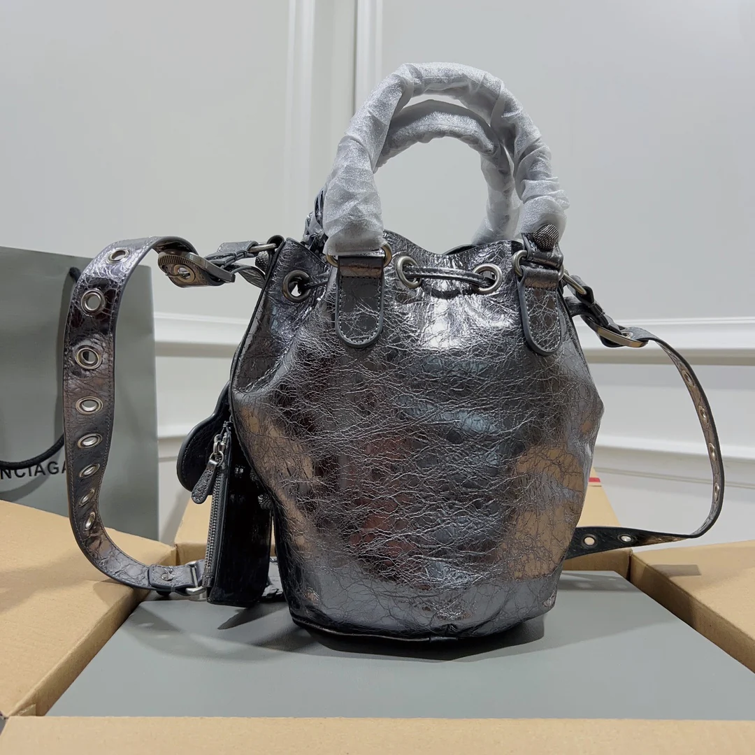 Metallic Balenciaga Bucket Bag with Studs and Adjustable Straps for Edgy Fashion Style No.3033 - Replicaclubs