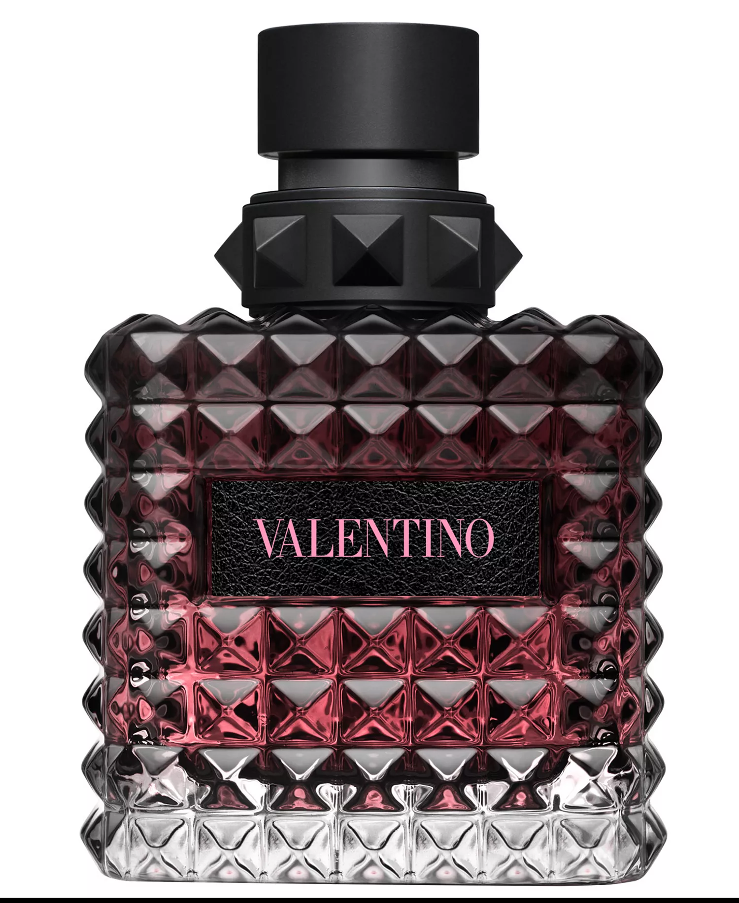 Close-up of the Valentino Donna Born In Roma Intense perfume bottle, highlighting the iconic glass rockstud design and black leather-textured logo plaque.
